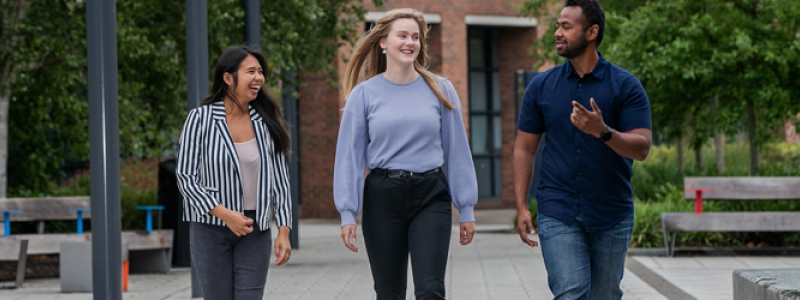 Ireland students walking through campus outside